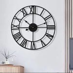 horloge murale industrielle vintage aiguilles métal chiffres romains noir doré salon decoration