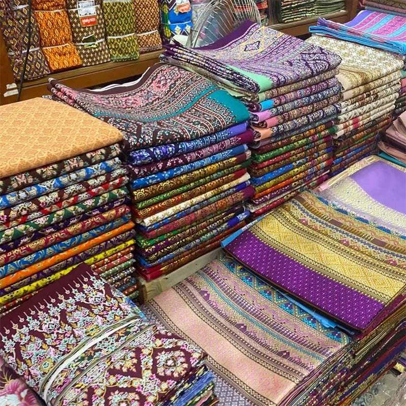 nappes lit massage motifs géométriques couleurs vives tissage traditionnel thaï opaque protection piano vert