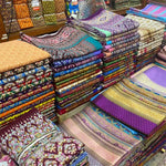 nappes lit massage motifs géométriques couleurs vives tissage traditionnel thaï opaque protection piano vert
