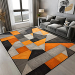 tapis géométrique moderne noir gris orange antidérapant facile nettoyer triangles cercle salon chambre