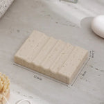 support savon pierre naturelle texture granulée minimaliste couleur beige clairintérieur décoration objet decoratif opacité