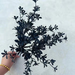 bouquet artificiel noir feuilles roses stylisées décoration maison événement table minimaliste