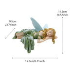 statuette fée dormante résine ailes translucides robe ondulée cheveux bouclés couleur verte bleu clair