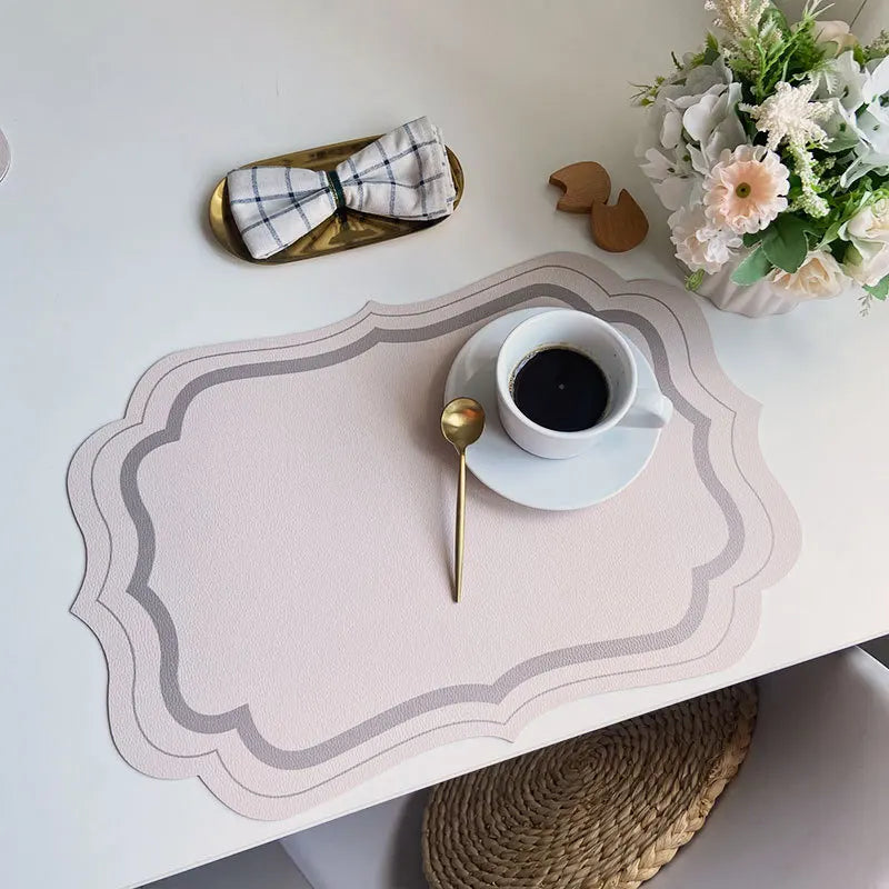 serviettes table moderne motif géométrique rose clair vert bleu beige ornementées