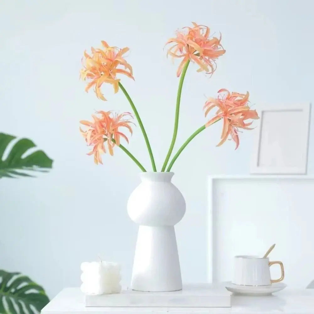 Bouquet artificiel moderne orange rouge blanc feuilles vertes vase blanc décoration intérieure noël minimaliste