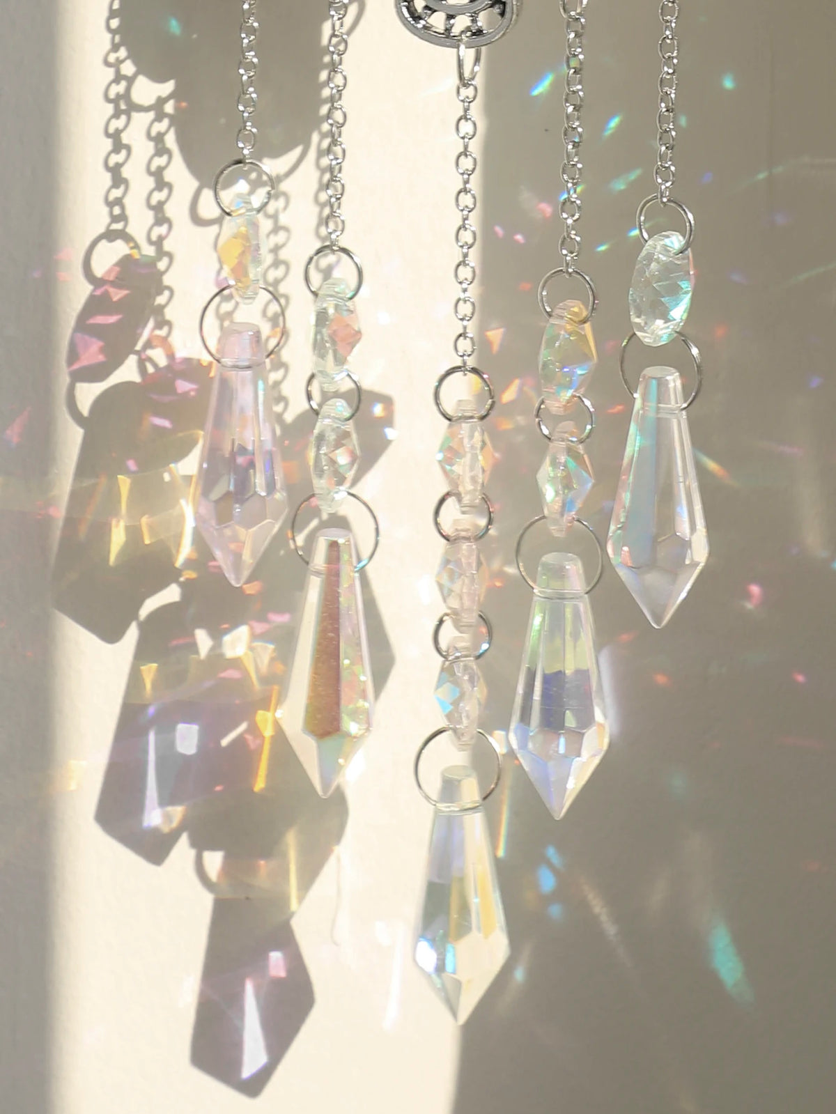 décoration jardin boho hamsa cristal prismes bleu argent transparent lumière capturante
