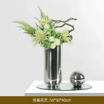 vase moderne argenté brillant fleurs artificielles blanches vertes décoration maison
