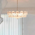 suspension lumineuse moderne élégante verre orange rond translucide chaîne métallique