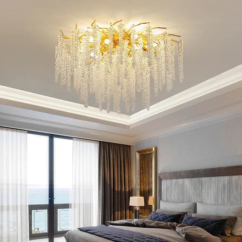 lustre moderne transparent branches goutte doré élégant illumination chambre salon