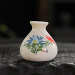 vases céramique artisanal poissons fleurs blanc bleu rouge vert