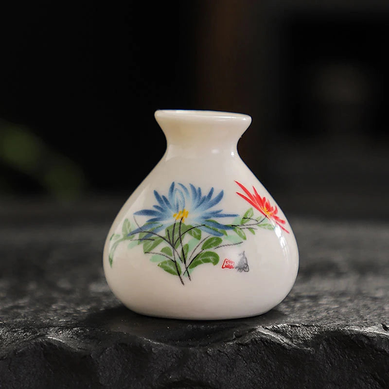 vases céramique artisanal poissons fleurs blanc bleu rouge vert