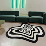 tapis noir blanc moderne abstrait rayures concentriques effet ondulé salon intérieur
