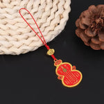 bijou sac élégant motifs géométriques texte chinois or rouge vert bleu noir clocheton doré