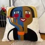 housse coussin coton brodé motifs abstraits visages stylisés moderne pop art bleu blanc orange