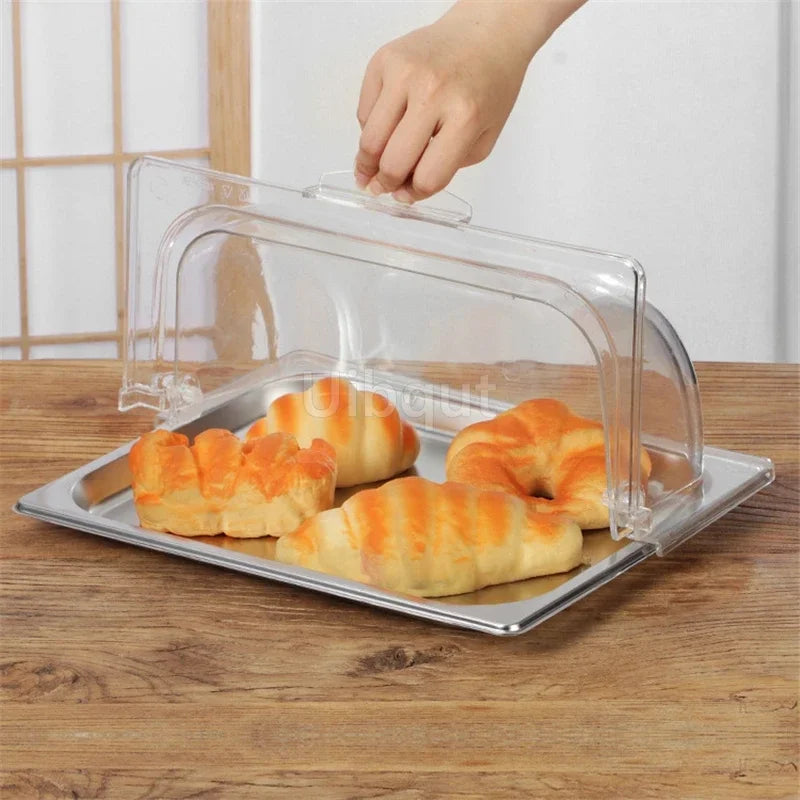 Corbeille à pain moderne en acier inoxydable avec couvercle dans un intérieur contemporain