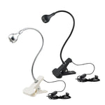 lumière led portable pince argentée noir blanc contemporaine minimaliste