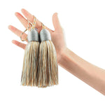 pompon porte décoration maison classique élégant couleur beige bleu marine noir blanc gris clair