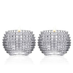 Bougeoir rond en verre doré sur table chic