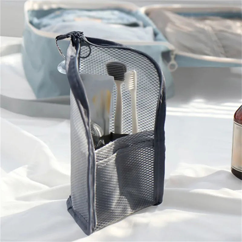sac toilette voyage transparent rose gris blanc maille minimaliste elastiques brosse dents dentifrice maquillage