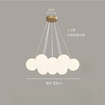 suspension lumineuse moderne blanc boules verre translucides 19 têtes fixée câbles