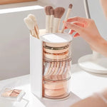 rangement rotatif blanc rose pâle transparent moderne accessoires capillaires brosse poudre rubans élastiques minimaliste