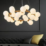 suspension moderne boules translucides blanc doré noir led restaurant salon bar