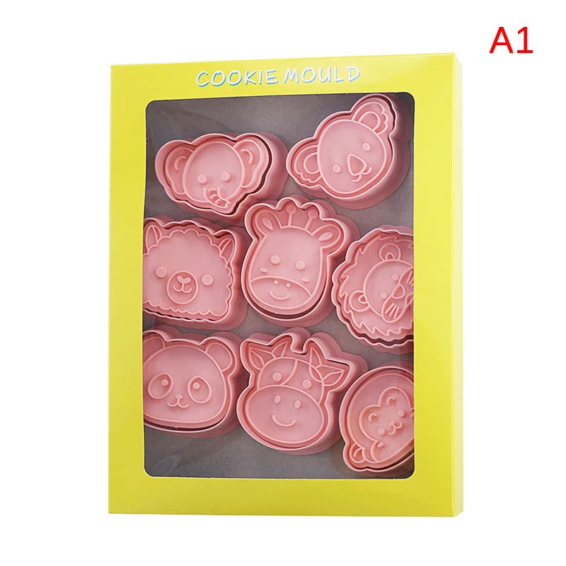 outils pâtisserie emporte pièces biscuits animaux dessin animé cartoon orange vert rose beige
