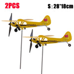 décor extérieur avion métal jaune classique vintage tringle métallique vent souffle jardinextérieur durable météo