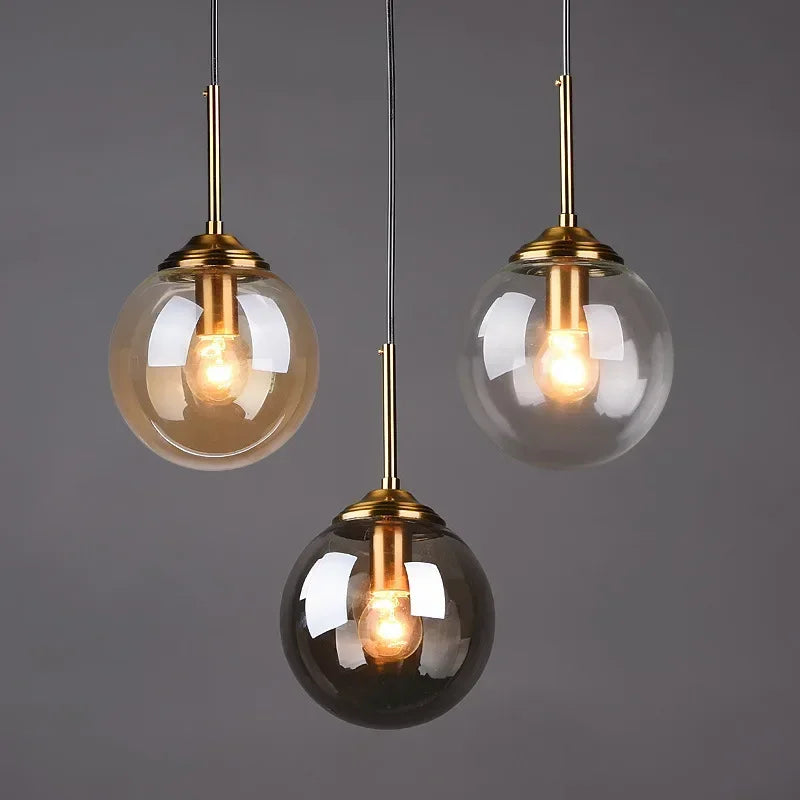 suspension lumineuse transparente moderne ampoule brillante câble noir minimaliste chambre salon étude