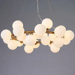 suspension moderne boules translucides blanc doré noir led restaurant salon bar