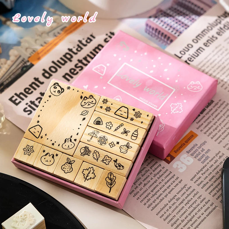 tampons bois décoratifs vintage motifs variés scrapbooking boîte rangement beige rose noir