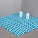 tapis salle bain blanc bleu turquoise vert gris jaune rose moderne minimaliste petits trous