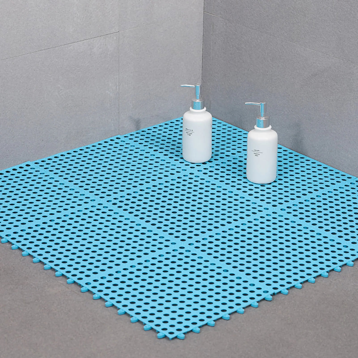 tapis salle bain blanc bleu turquoise vert gris jaune rose moderne minimaliste petits trous