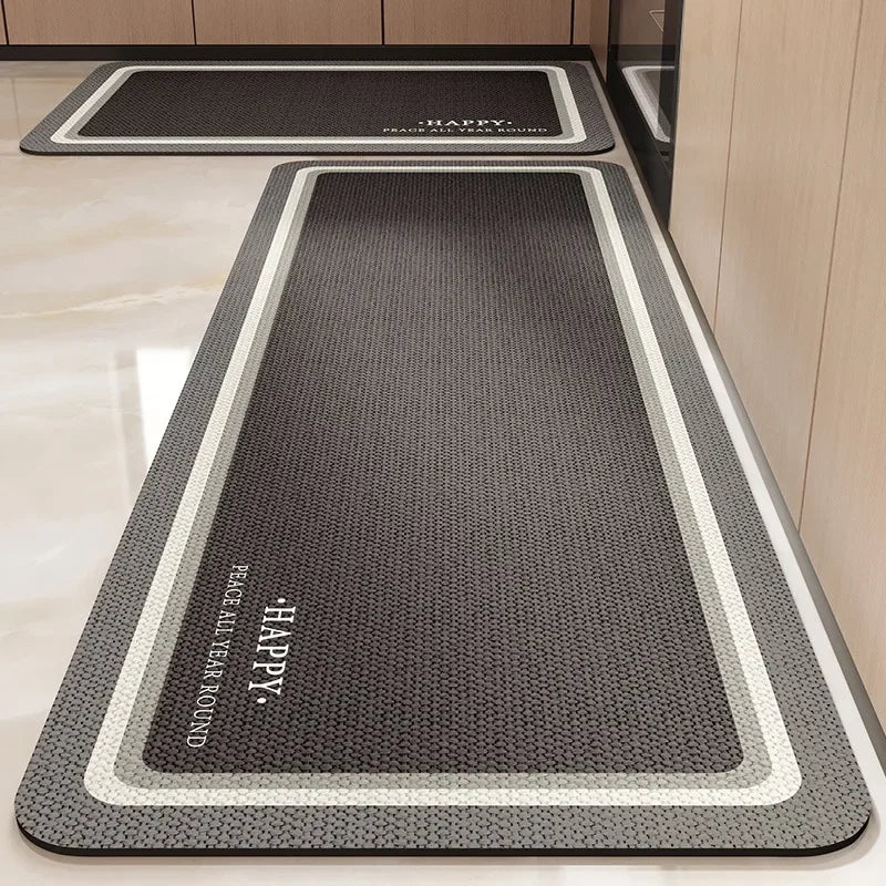 Tapis d'entrée rectangulaire de couleur grise avec bordures blanches, idéal pour accueillir les visiteurs dans un hall.