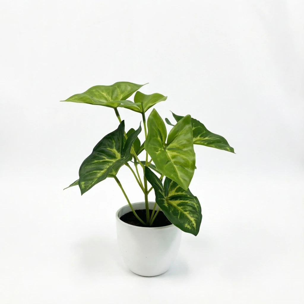 plante artificielle pot blanc feuilles vertes motif jaunes deco intérieure table