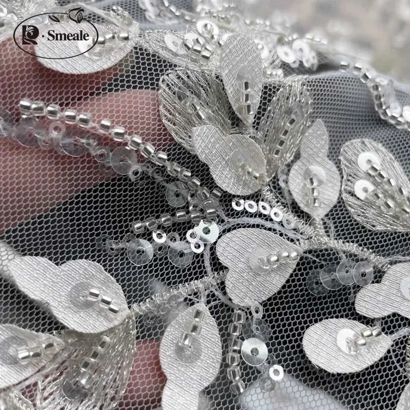 tissu décoratif gris clair feuilles relief sequins semi transparent brodé élégant polyester 150cm 128cm