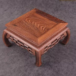 supports bois sculptés vases peints main artisanat traditionnel fleurs oiseaux motifs géométriques vert clair