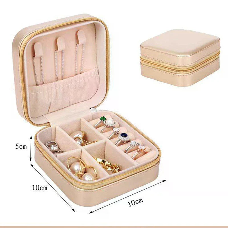 boîte bijoux velours beige rose noir moderne fermeture glissière rangement colliers boucles oreilles exposé