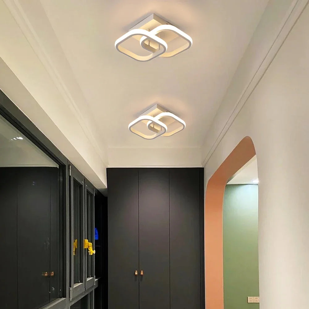 plafonnier led moderne géométrique anneaux superposés luminaire acrylique salon chambre couloir intérieur