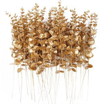 vase blanc moderne fleurs artificielles feuilles vertes décoration table intérieure