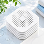 filtre bain réutilisable perforations géométriques adhésif blanc gris moderne respectueux environnement