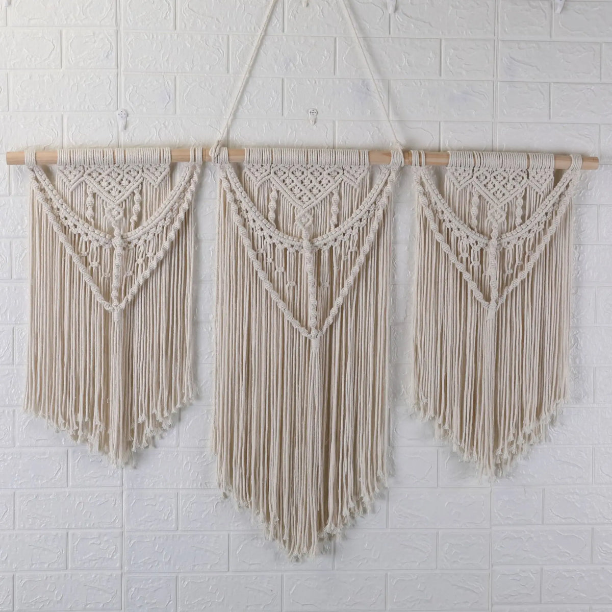 tapisserie macramé bohème franges géométriques beige clair mur décoration artisanal coton lavage main