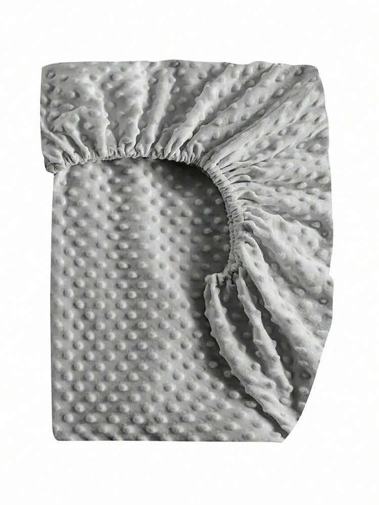 drap housse lit bébé gris blanc moderne perforations points élastiques doux