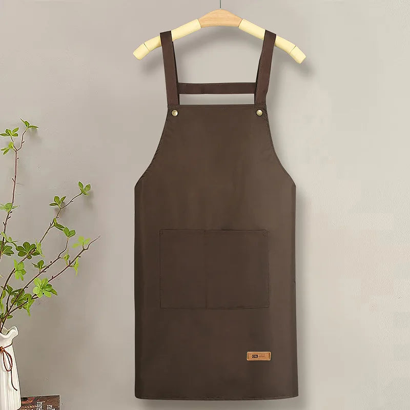 tablier cuisine toile gris foncé beige clair poche avant élégants cuir vert foncé marron