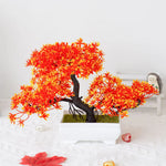 décoration intérieure bonsaï artificiel rouge rose jaune vert feuilles fines tronc noir base carrée