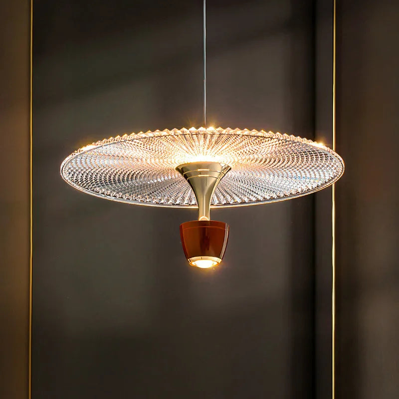 suspension lumineuse moderne élégante dorée transparente câble suspendu chambre salon étude