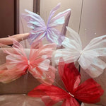 décoration intérieure moderne papillon transparent effet pailleté rose blanc rouge bleuclair