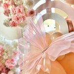 Décoration baby shower avec papillons jaune fluo