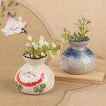 vases céramique artisanal poissons fleurs blanc bleu rouge vert