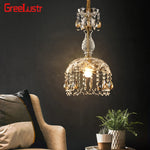 lampe suspendue dorée cristal transparent classique élégante chambre salle manger véranda